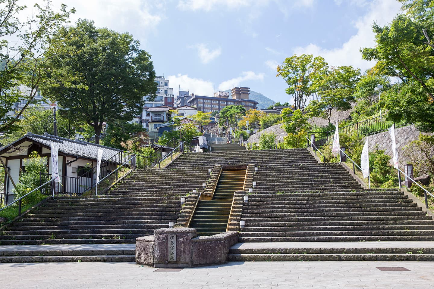 Ikaho Onsen in gunma, Japan - A historic hot spring town built on a mountainside, famous for its iconic 365-step stone staircase lined with traditional ryokan, shops, and two types of therapeutic spring water.