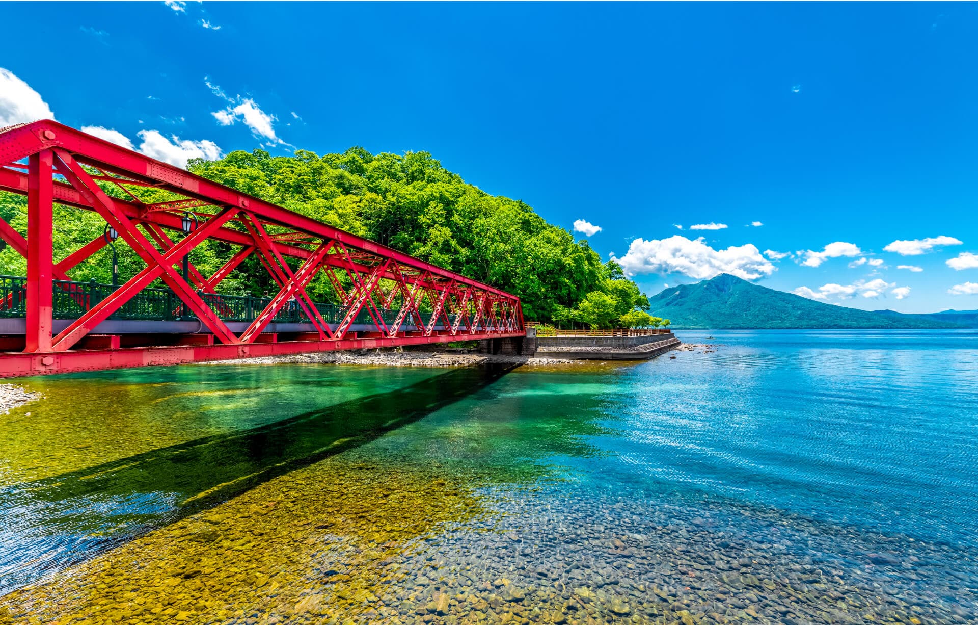 Lake Shikotsu in hokkaido, Japan - Japan's second-deepest and northernmost ice-free lake, renowned for exceptional water clarity, pristine natural surroundings, and seasonal beauty.