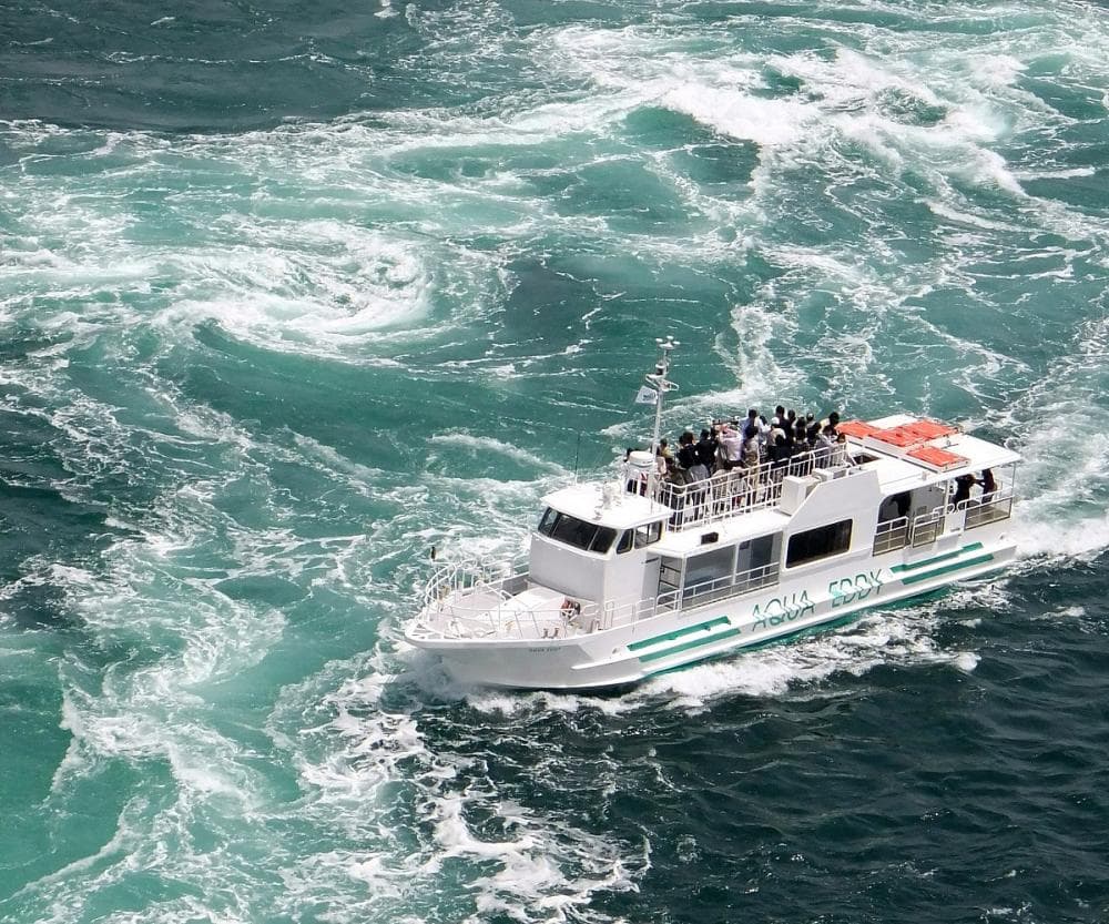 Naruto Whirlpools in tokushima, Japan - Spectacular natural whirlpools reaching 20 meters diameter in Naruto Strait, viewed from bridge walkways and sightseeing boats.