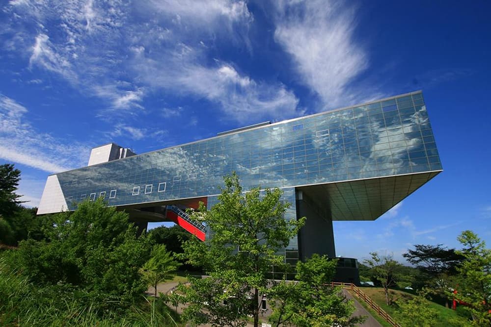 Akita Museum of Art in akita, Japan - A striking waterfront museum designed by Tadao Ando, featuring the world's largest collection of works by Tsuguharu Foujita, including the monumental 'Events in Akita' mural.