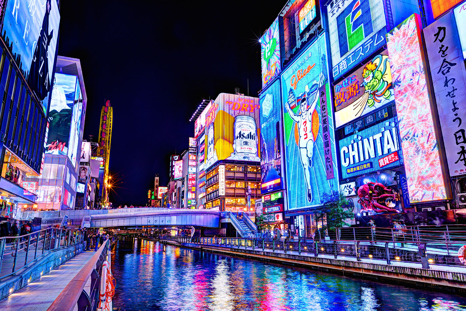 Dotonbori in osaka, Japan - Osaka's most famous entertainment and dining district, known for its dazzling neon lights, enormous street food signs, and vibrant nightlife atmosphere.