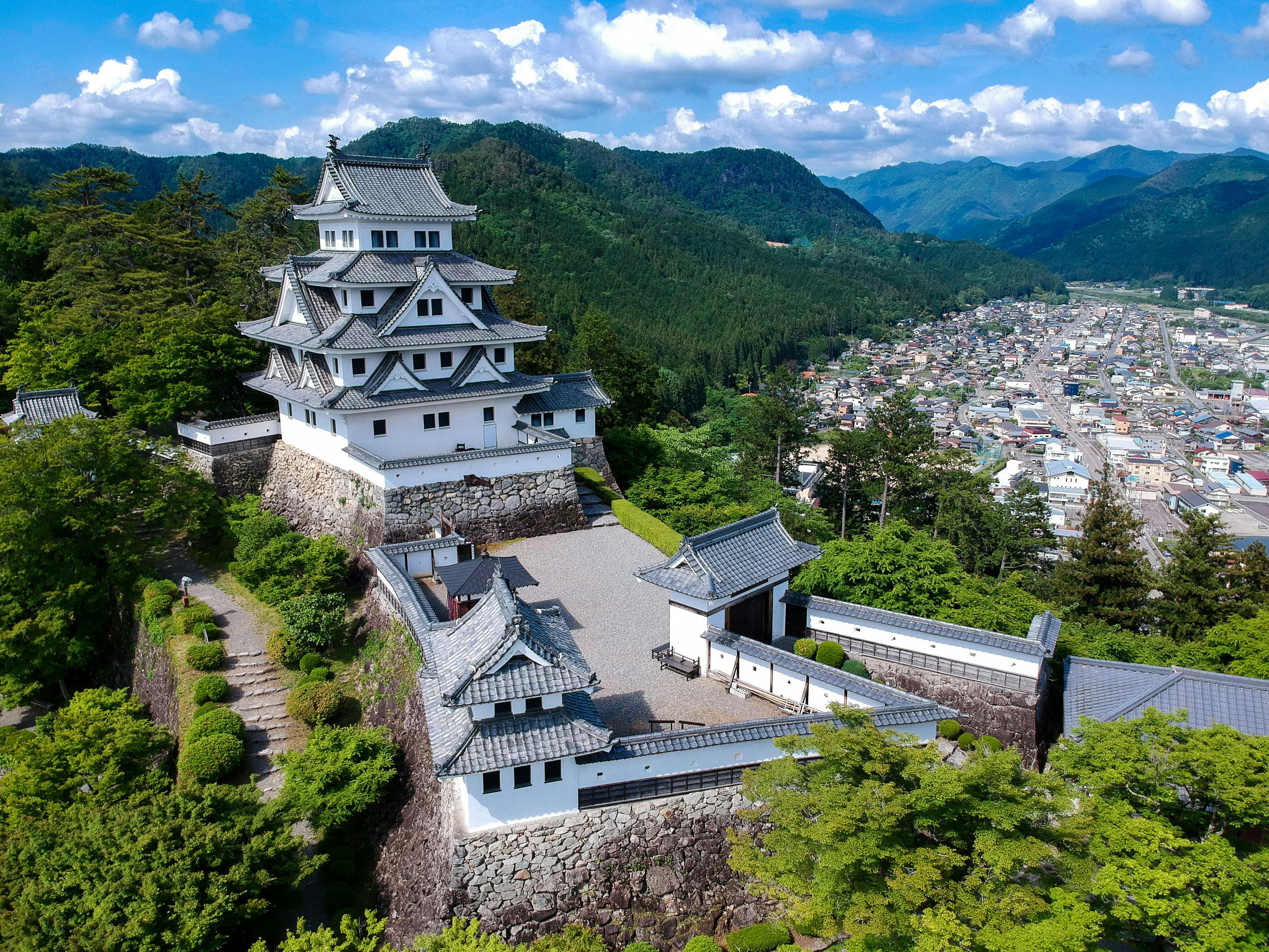 Gujo Hachiman Town in gifu, Japan - Charming castle town renowned for crystal-clear waterways, traditional dance festivals, and authentic food replica workshops in the mountains of Gifu.