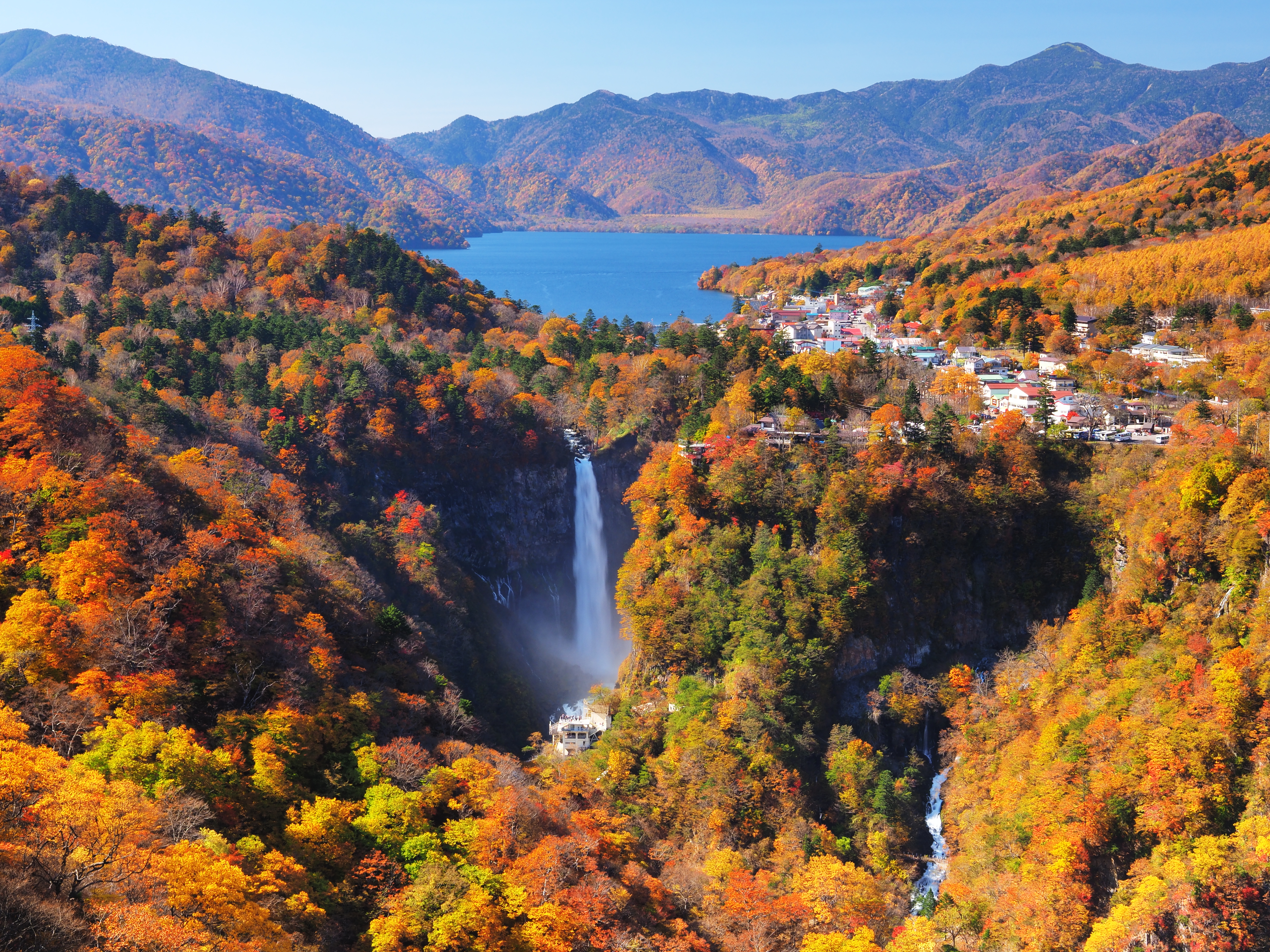 Lake Chuzenji & Kegon Falls in tochigi, Japan - A stunning mountain lake formed by volcanic eruption, paired with Kegon Falls - one of Japan's three most beautiful waterfalls cascading 97 meters into a dramatic gorge.