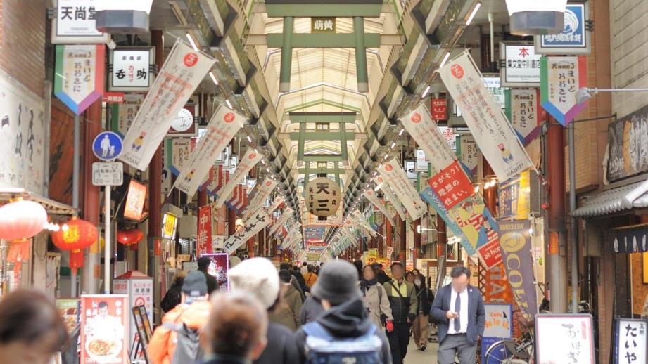 Tenjinbashisuji Shopping Street in osaka, Japan - Japan's longest covered shopping arcade stretching 2.6 kilometers with over 600 shops selling everything from traditional crafts to street food, offering authentic local Osaka shopping experience.