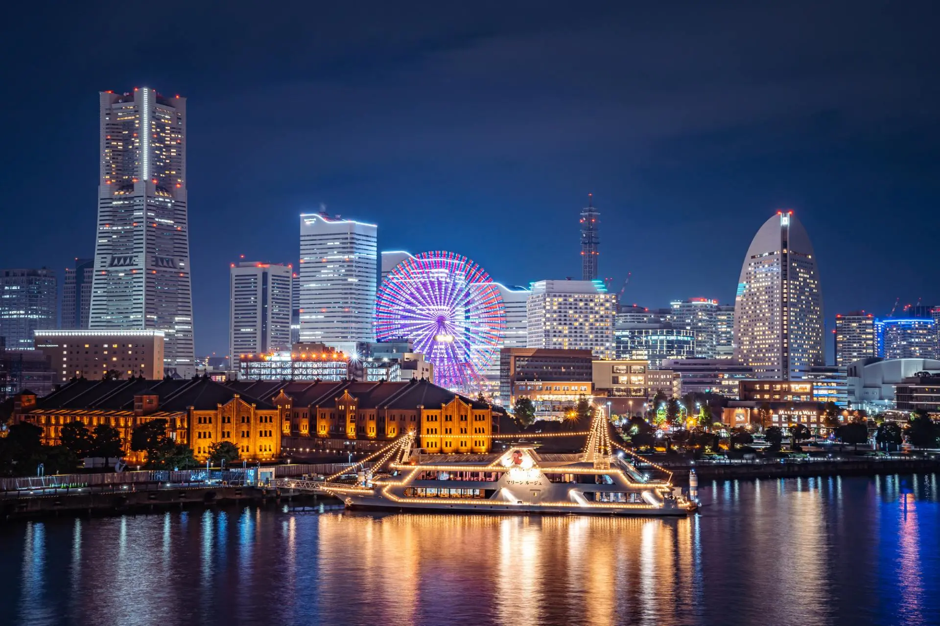 Yokohama Minato Mirai in kanagawa, Japan - A futuristic waterfront district featuring Japan's tallest building Landmark Tower, modern museums, shopping malls, historic ships, and spectacular nighttime illumination.