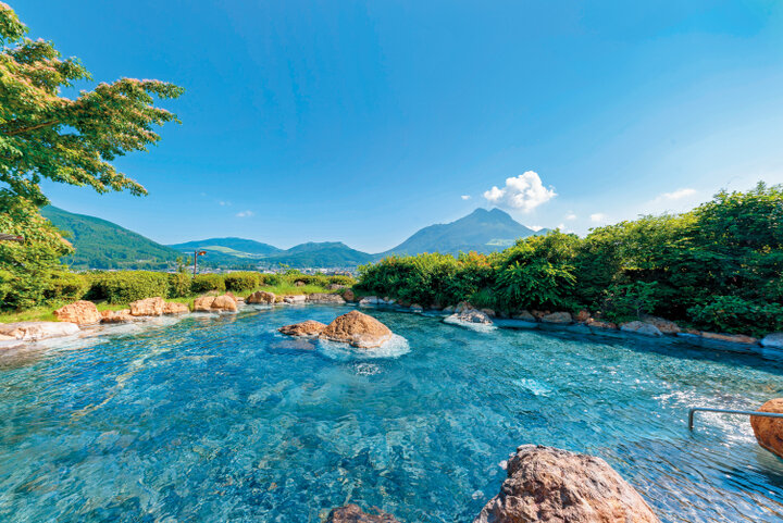 Yufuin Onsen in oita, Japan - Picturesque hot spring resort town at the foot of Mount Yufu with art galleries, boutique shops, scenic Lake Kinrinko, and upscale ryokan.