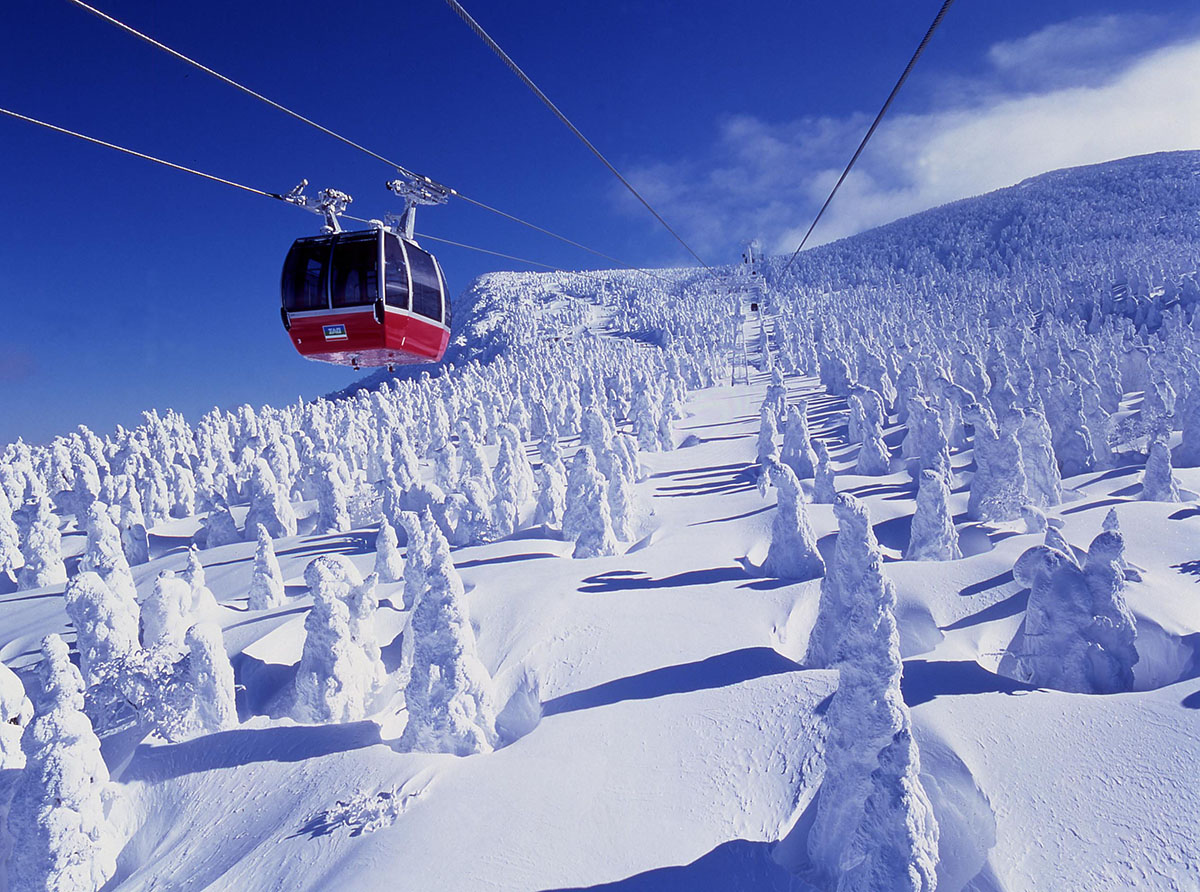 Zao Onsen & Snow Monsters in yamagata, Japan - A historic mountain hot spring resort famous for acidic milky-white waters and the surreal juhyo 'snow monsters' - frost-covered trees creating otherworldly winter landscapes.